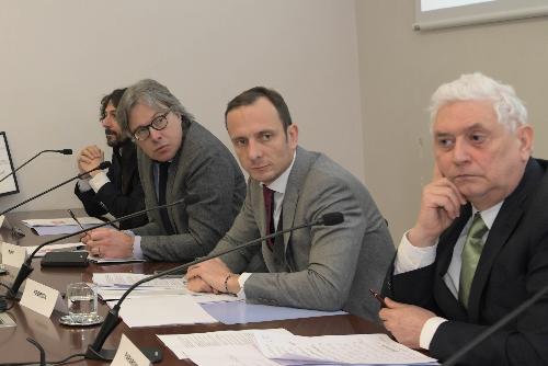 Il governatore Fedriga e l'assessore Bini con il curatore del progetto, il critico d'arte Demetrio Paparoni 